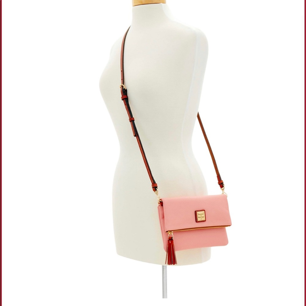 Dooney and Bourke pale pink pebble leather foldover crossbody bag